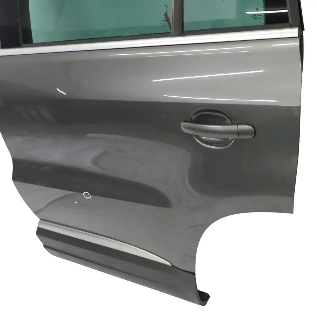 Door Rear Left N/S Pepper Grey Metallic - D7R to Volkswagen VW Tiguan 5N with Part number 5N0833055A Volkswagen VW Tiguan 5N Door Rear Left N/S Pepper Grey Metallic - D7R - SKU 5N0833055A-PEG - Part number 5N0833055A