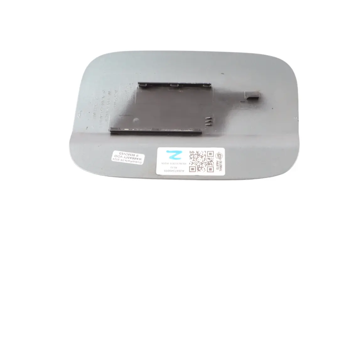 Filler Flap Tank Cap Cover Alabandine Grey 779 to Mercedes W204 Fuel with Part number A2047540009 Mercedes W204 Fuel Filler Flap Tank Cap Cover Alabandine Grey 779 - SKU A2047540009-ALG - Part number A2047540009