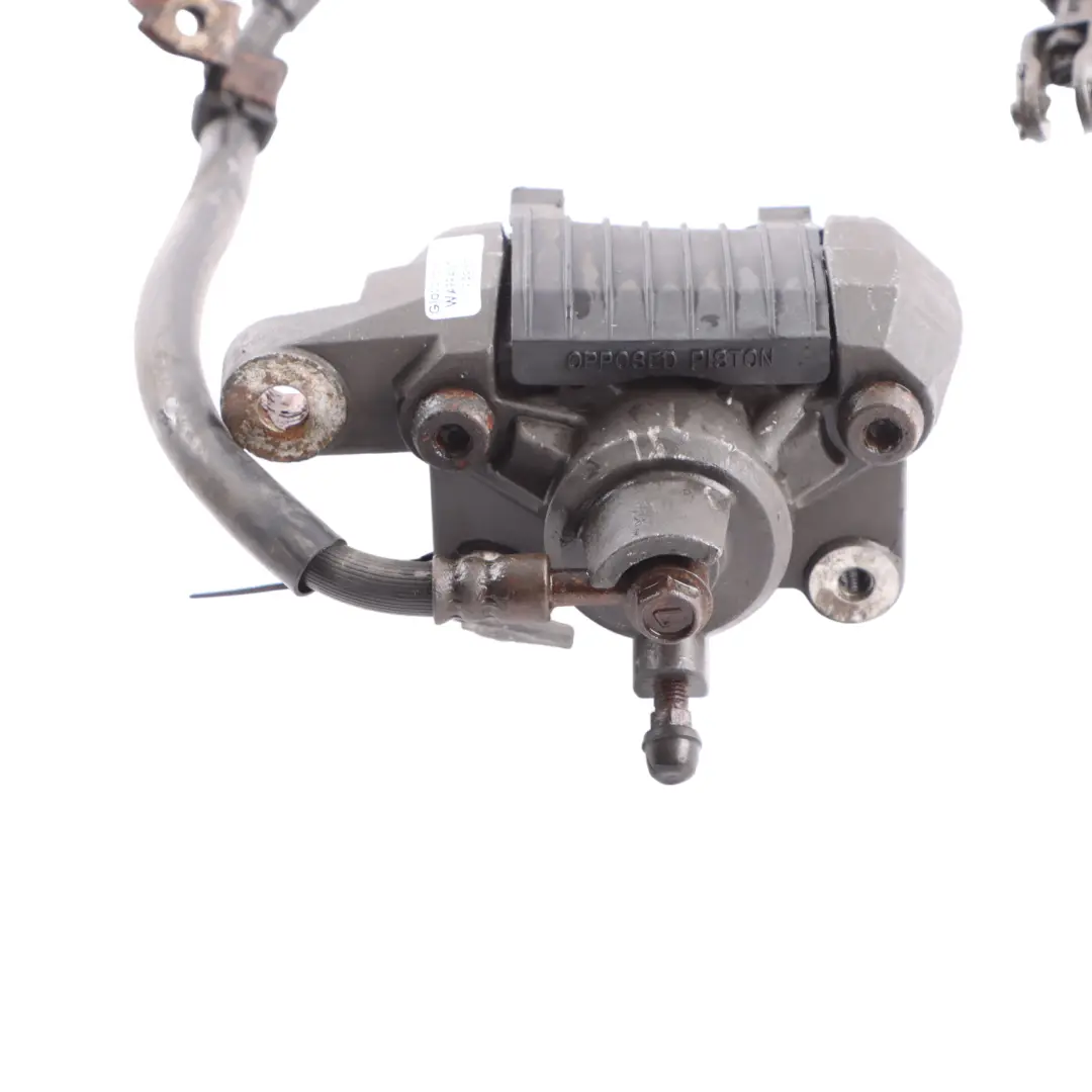 Brake Caliper Unit 69100-05851-000 to Suzuki SV 650S Rear Wheel with Part number 6910005851000 Suzuki SV 650S Rear Wheel Brake Caliper Unit 69100-05851-000 - SKU 6910005851000 - Part number 6910005851000