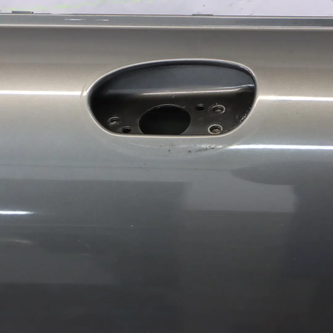 Puerta Delantera Derecha Royal Grey Metallic - A48 para Mini Cooper R50 R52 R53 con número de pieza 7202912 Mini Cooper R50 R52 R53 Puerta Delantera Derecha Royal Grey Metallic - A48 - SKU 7202912-ROG - Número de pieza 7202912