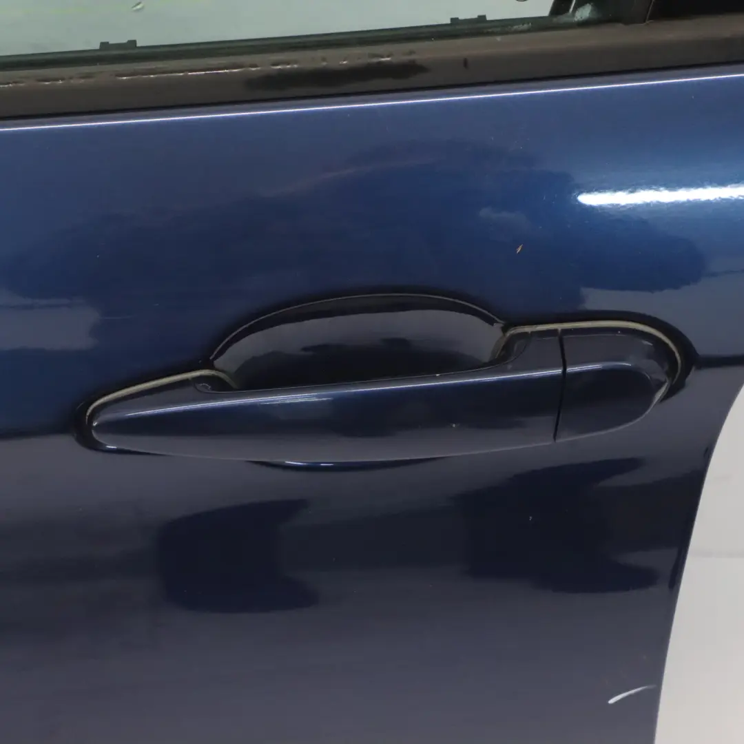 Door Front Left N/S Tiefseeblau Deep Sea Blue Metallic - A76 to BMW X1 E84 with Part number 7339357 BMW X1 E84 Door Front Left N/S Tiefseeblau Deep Sea Blue Metallic - A76 - SKU 7339357-DSB - Part number 7339357