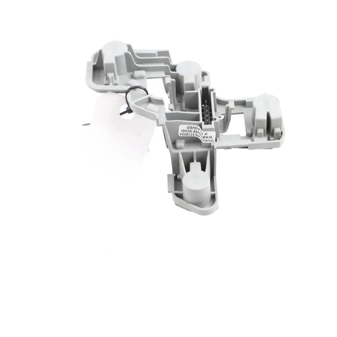 Left N/S Light Side Panel Bulb Support Mount to Mercedes CL203 Rear with Part number A2038201177 Mercedes CL203 Rear Left N/S Light Side Panel Bulb Support Mount - SKU A2038201177 - Part number A2038201177