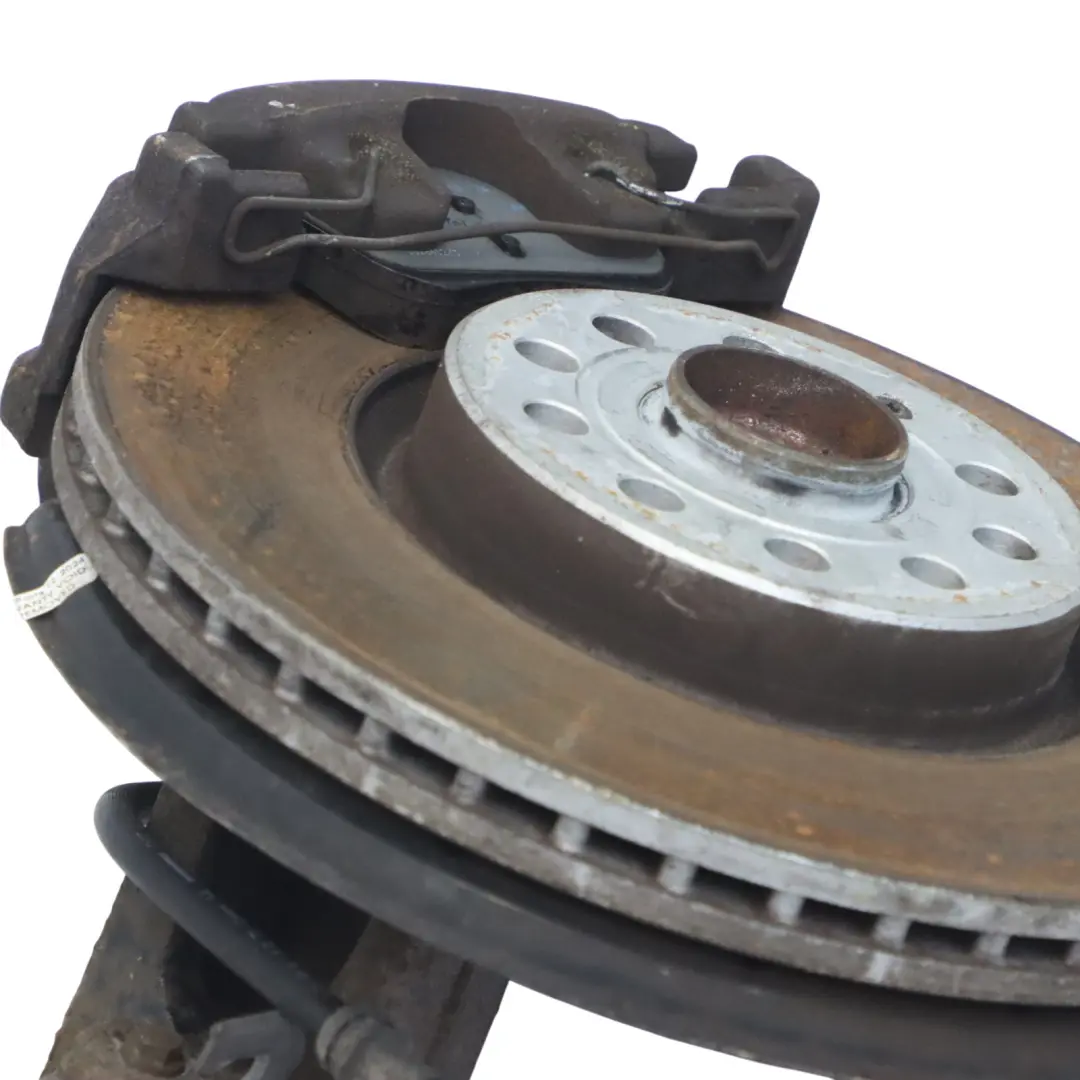 Noga Zawieszenia Prawy Przód Zwrotnica Tarcza Zacisk do Volkswagen Tiguan 5N o numerze 5N0413031AP Volkswagen Tiguan 5N Noga Zawieszenia Prawy Przód Zwrotnica Tarcza Zacisk - SKU 5N0413031AP-1 - Numer Części 5N0413031AP