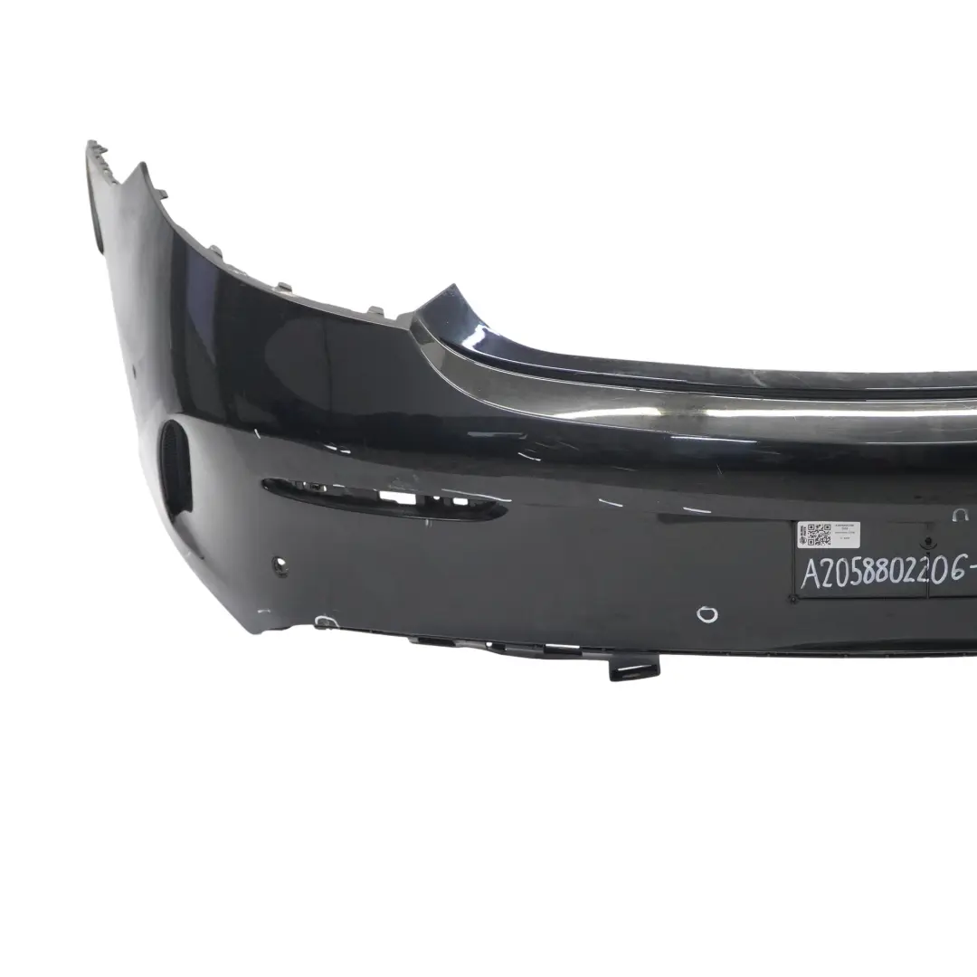 Bumper Rear Trim Panel Covering AMG Obsidian Black Metallic - 197 to Mercedes C205 with Part number A2058802206 Mercedes C205 Bumper Rear Trim Panel Covering AMG Obsidian Black Metallic - 197 - SKU A2058802206-OB2 - Part number A2058802206