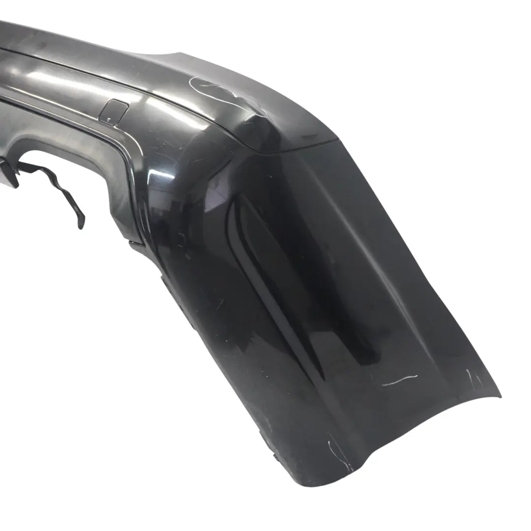 Bumper AMG V12 S65 Trim Panel Obsidian Black Metallic - 197 to Mercedes W221 Rear with Part number A2218802040 Mercedes W221 Rear Bumper AMG V12 S65 Trim Panel Obsidian Black Metallic - 197 - SKU A2218802040-OB - Part number A2218802040
