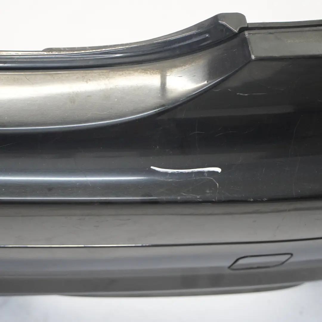 Bumper AMG V12 S65 Trim Panel Obsidian Black Metallic - 197 to Mercedes W221 Rear with Part number A2218802040 Mercedes W221 Rear Bumper AMG V12 S65 Trim Panel Obsidian Black Metallic - 197 - SKU A2218802040-OB - Part number A2218802040