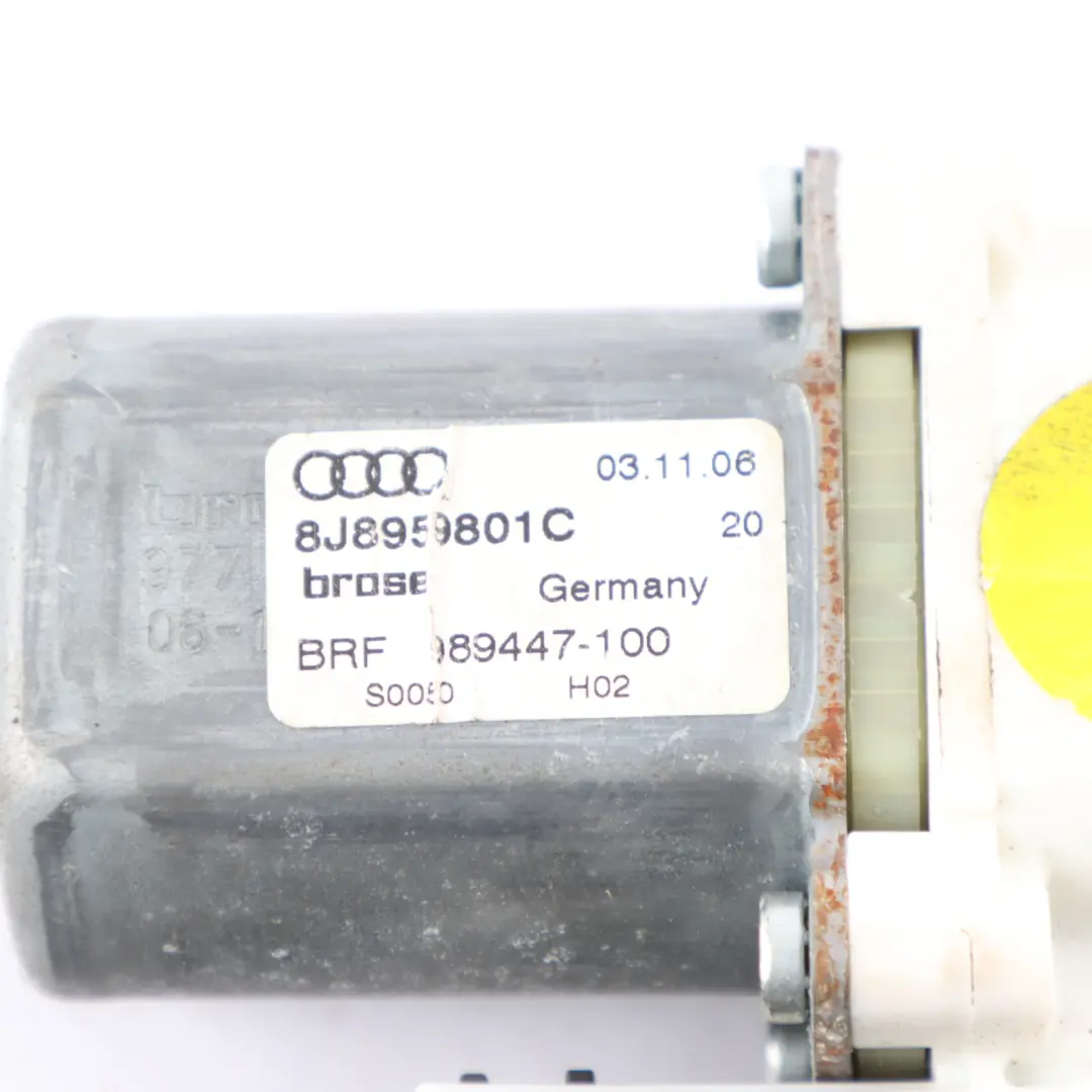 Silnik Podnośnika Szyby Przód Przedni Prawy do Audi TT 8J o numerze 8J8959801C Audi TT 8J Silnik Podnośnika Szyby Przód Przedni Prawy - SKU 8J8959801C - Numer Części 8J8959801C