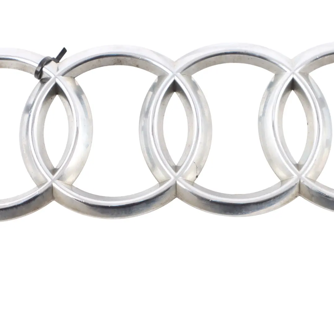 Audi A1 8X Logo Griglia Anteriore - SKU 8X0853605 - Numero di parte 8X0853605