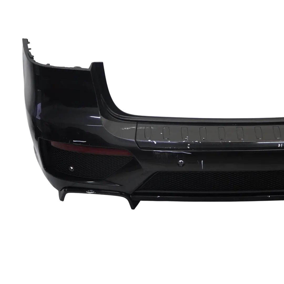 Bumper Rear AMG Trim Panel ML 63 Covering Obsidian Black - 197 to Mercedes W166 with Part number A1668855425 Mercedes W166 Bumper Rear AMG Trim Panel ML 63 Covering Obsidian Black - 197 - SKU A1668855425-OB - Part number A1668855425