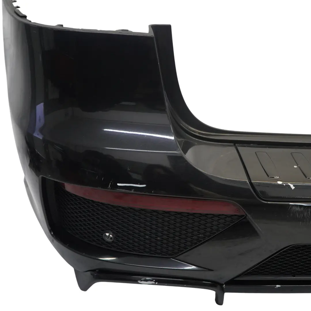 Bumper Rear AMG Trim Panel ML 63 Covering Obsidian Black - 197 to Mercedes W166 with Part number A1668855425 Mercedes W166 Bumper Rear AMG Trim Panel ML 63 Covering Obsidian Black - 197 - SKU A1668855425-OB - Part number A1668855425