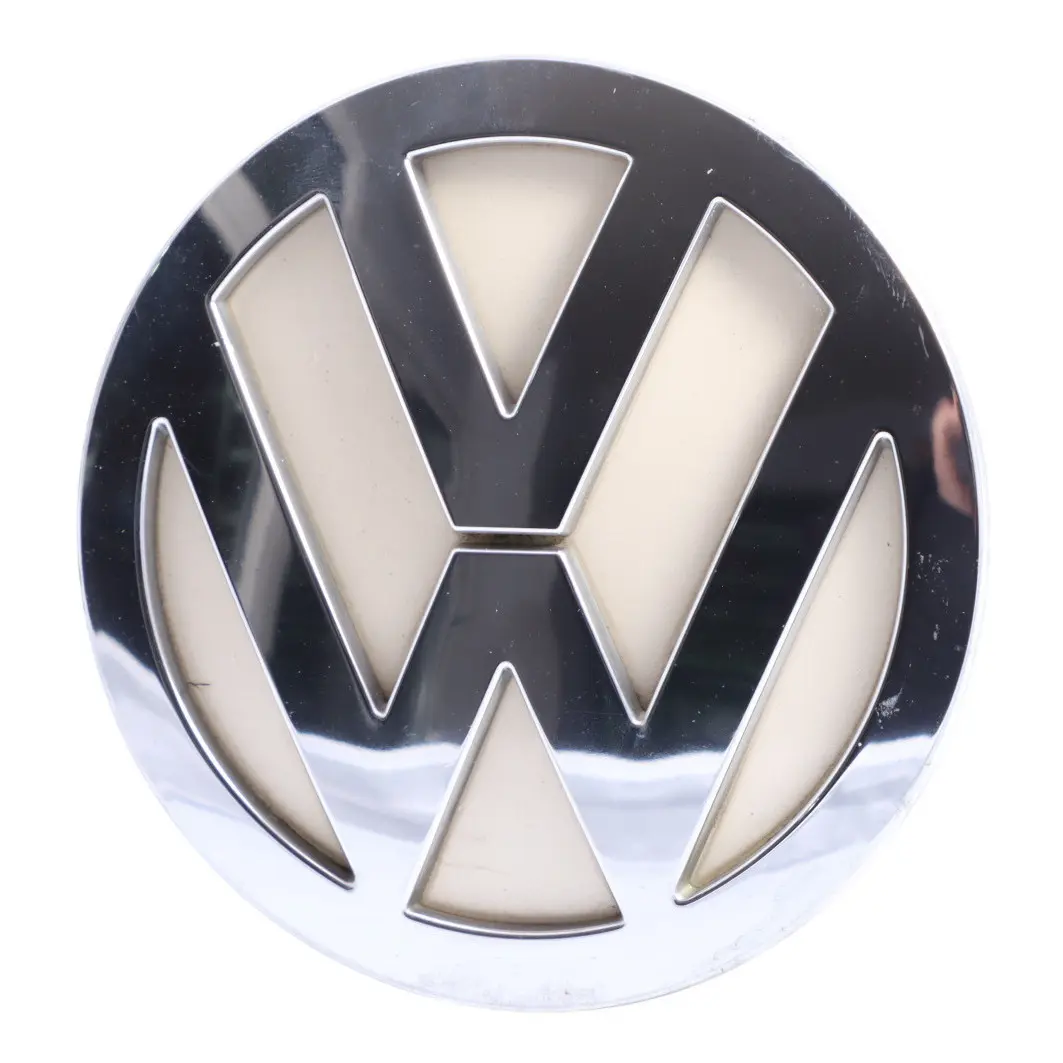 Genuine Emblem Harvest Moon Beige - B1M to VW Volkswagen Logo Rear with Part number 1C0853630M VW Volkswagen Logo Rear Genuine Emblem Harvest Moon Beige - B1M - SKU 1C0853630M-HMB - Part number 1C0853630M