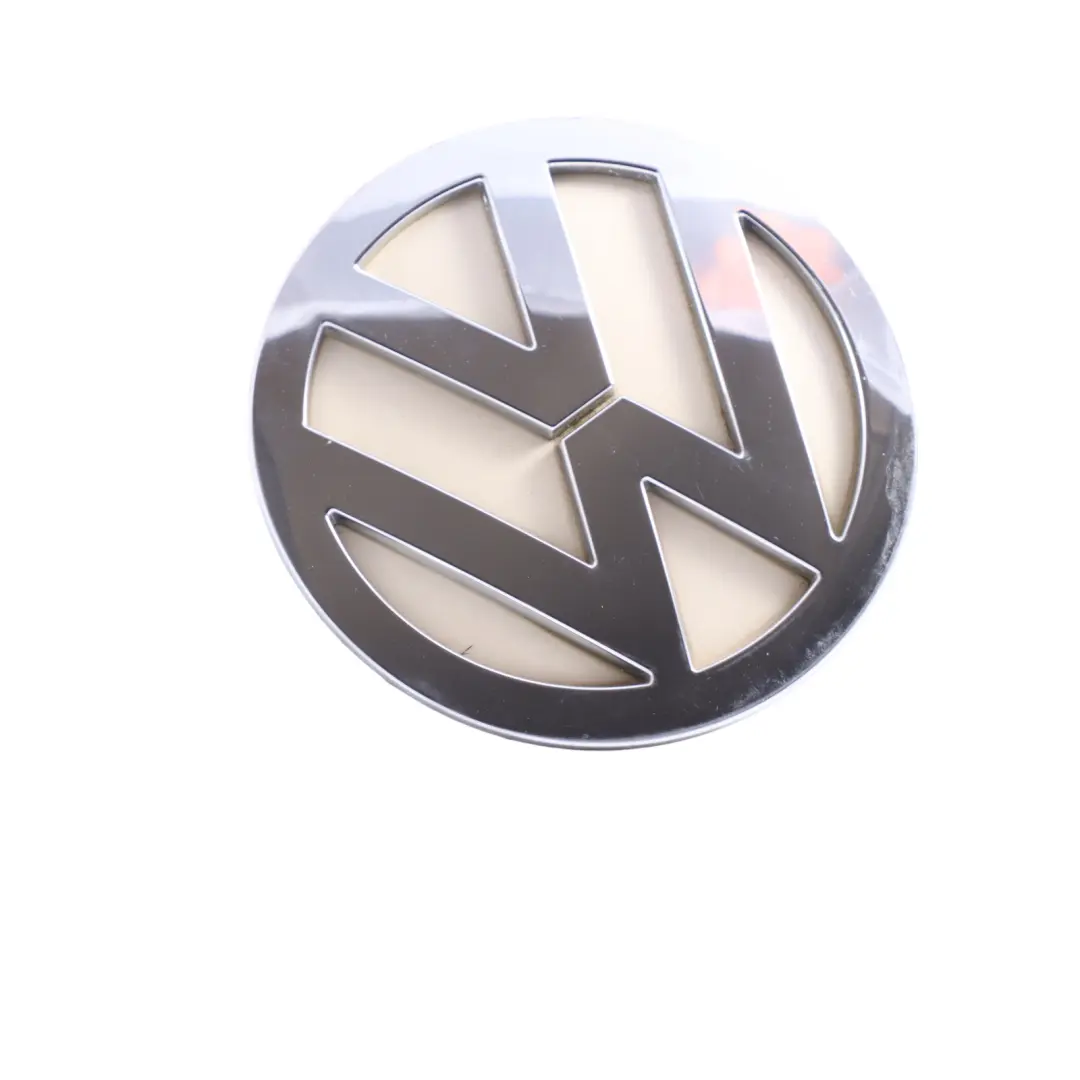 Genuine Emblem Harvest Moon Beige - B1M to VW Volkswagen Logo Rear with Part number 1C0853630M VW Volkswagen Logo Rear Genuine Emblem Harvest Moon Beige - B1M - SKU 1C0853630M-HMB - Part number 1C0853630M