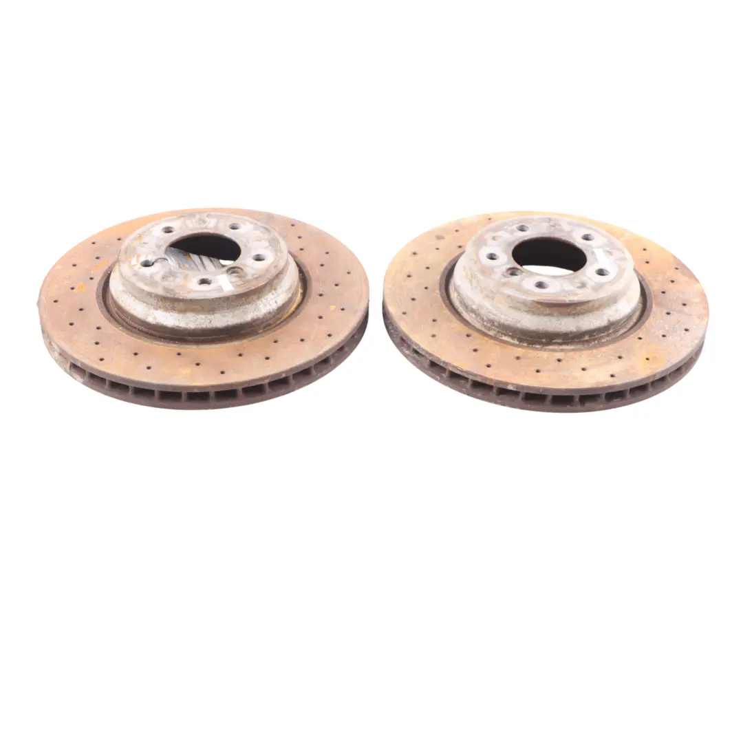 Front Left Right N/O/S Perforated Wheel Brake Disc Set to BMW 3 E90 E91 E92 E93 with Part number 6855000 BMW 3 E90 E91 E92 E93 Front Left Right N/O/S Perforated Wheel Brake Disc Set - SKU 6855000-1 - Part number 6855000