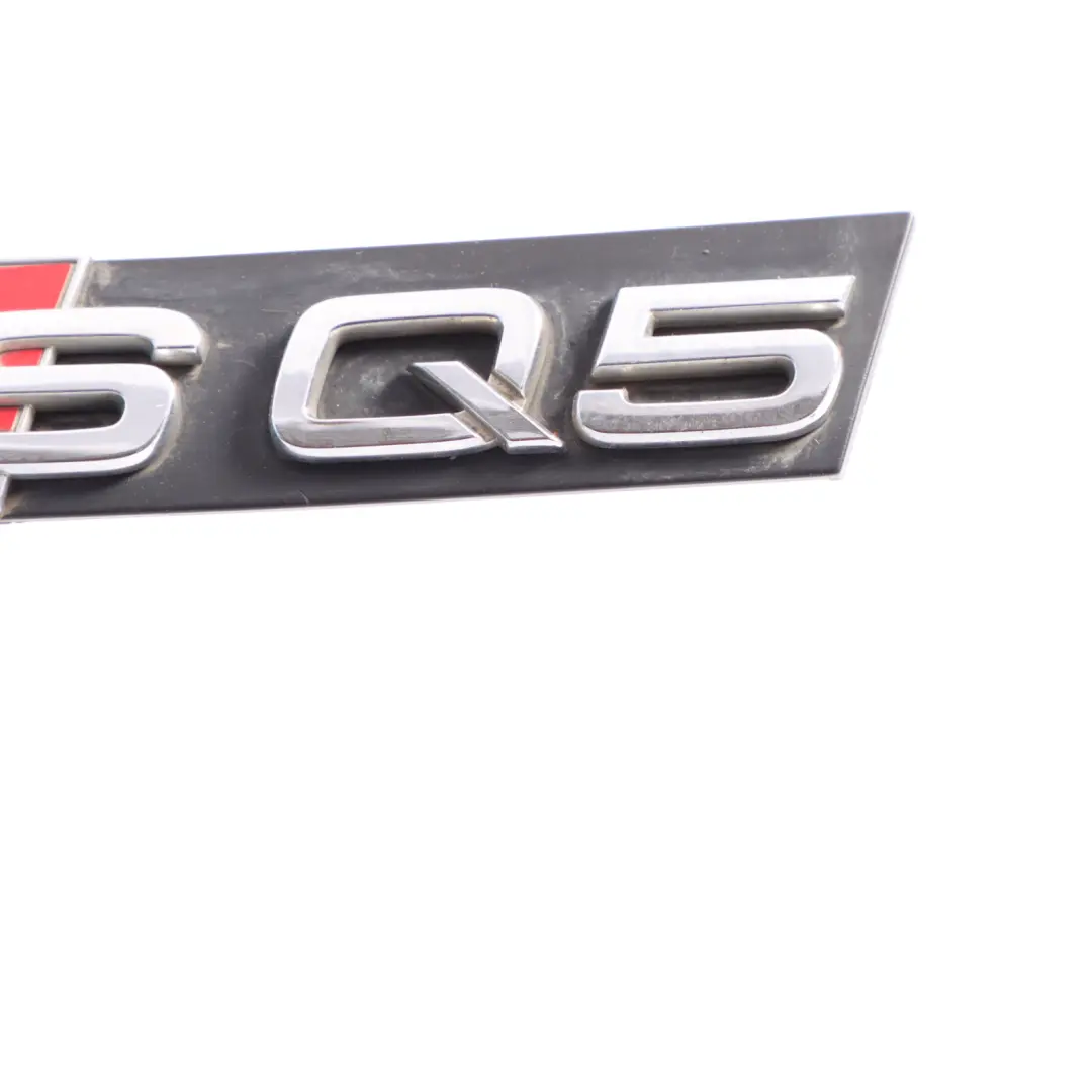 Audi SQ5 Front Bumper Grille Emblem SQ5 Logo - SKU 8R0853737B - Part number 8R0853737B