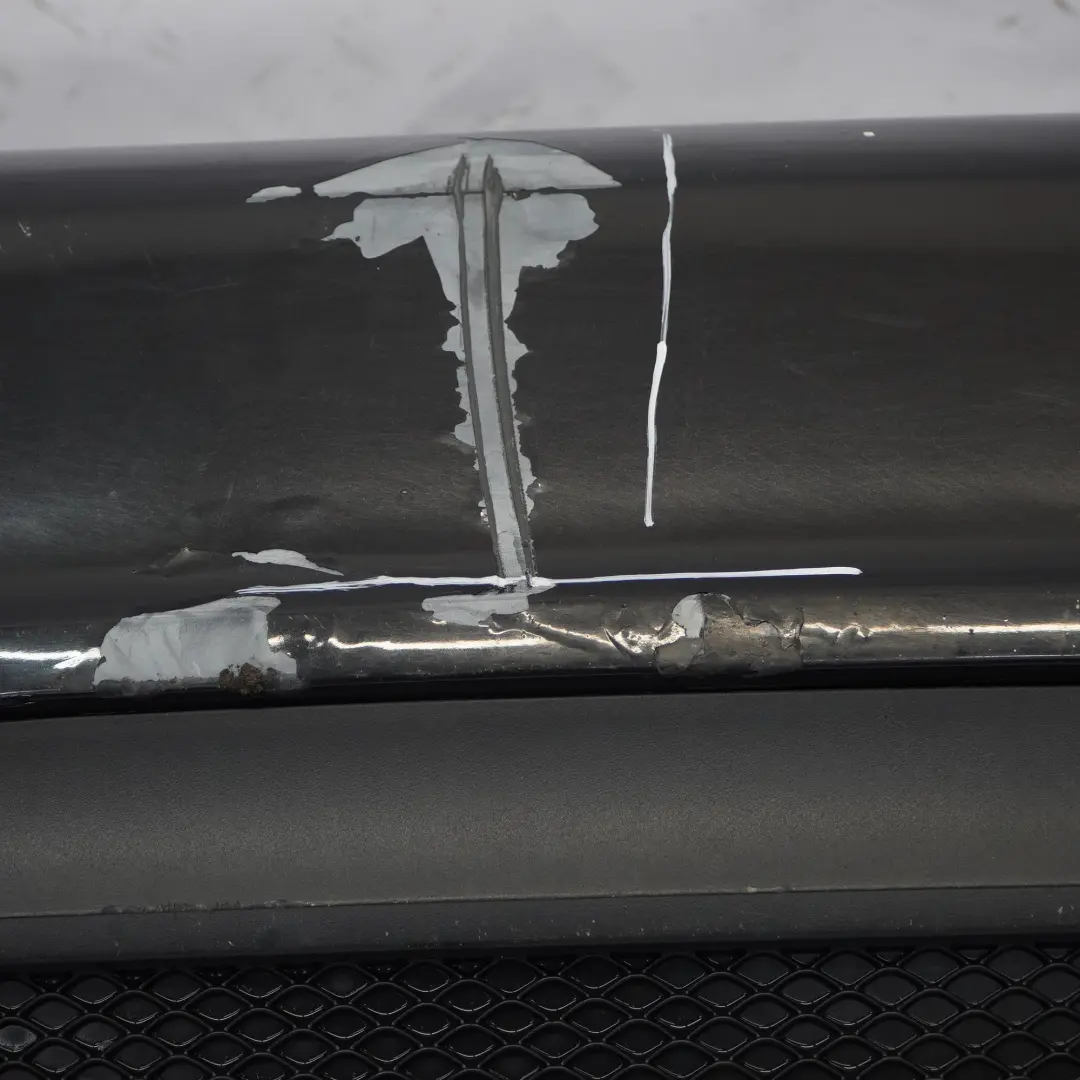 Bumper Rear Trim Panel AMG Kosmos Black Metallic - 191 to Mercedes W176 with Part number A1768805740 Mercedes W176 Bumper Rear Trim Panel AMG Kosmos Black Metallic - 191 - SKU A1768805740-KB - Part number A1768805740