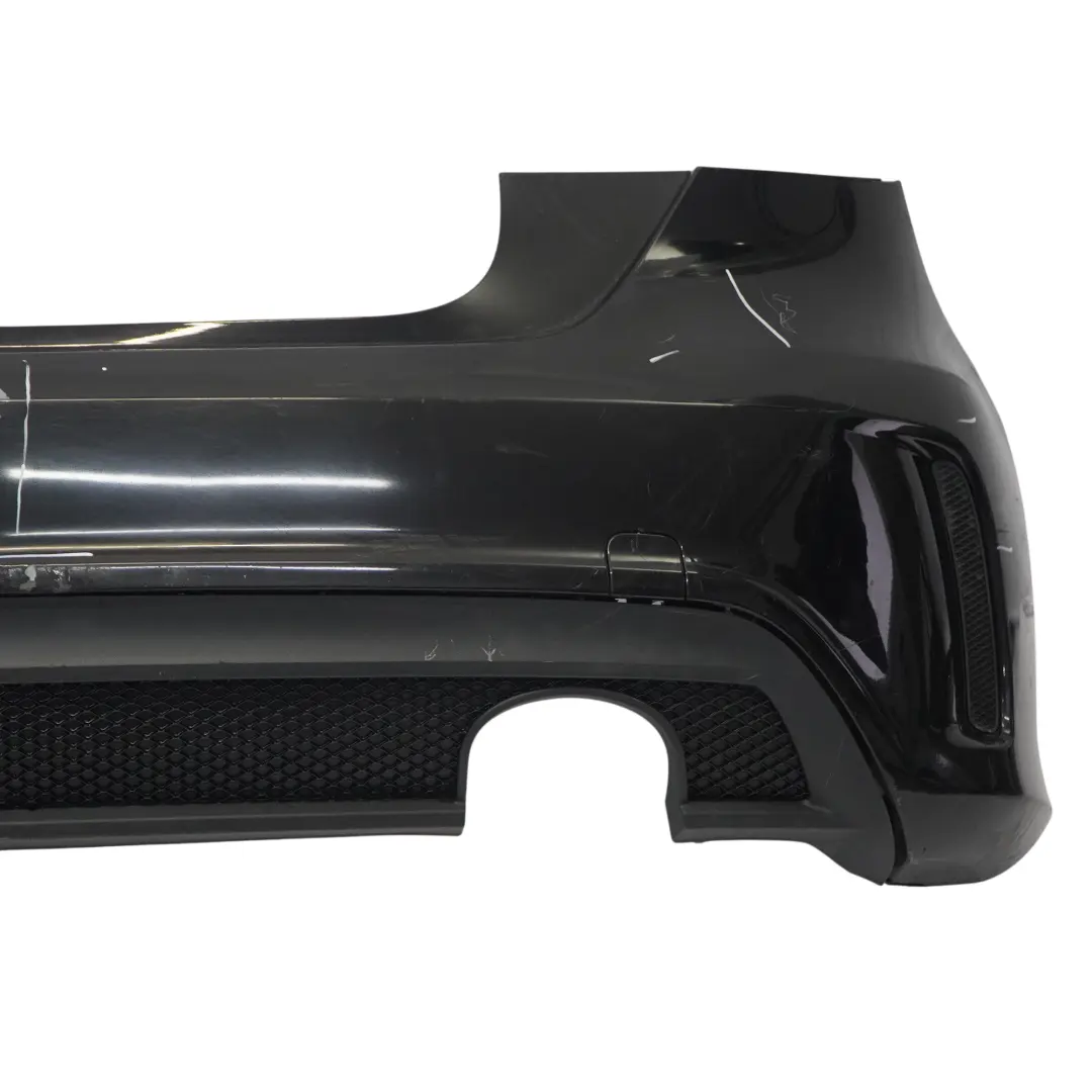 Bumper Rear Trim Panel AMG Kosmos Black Metallic - 191 to Mercedes W176 with Part number A1768805740 Mercedes W176 Bumper Rear Trim Panel AMG Kosmos Black Metallic - 191 - SKU A1768805740-KB - Part number A1768805740