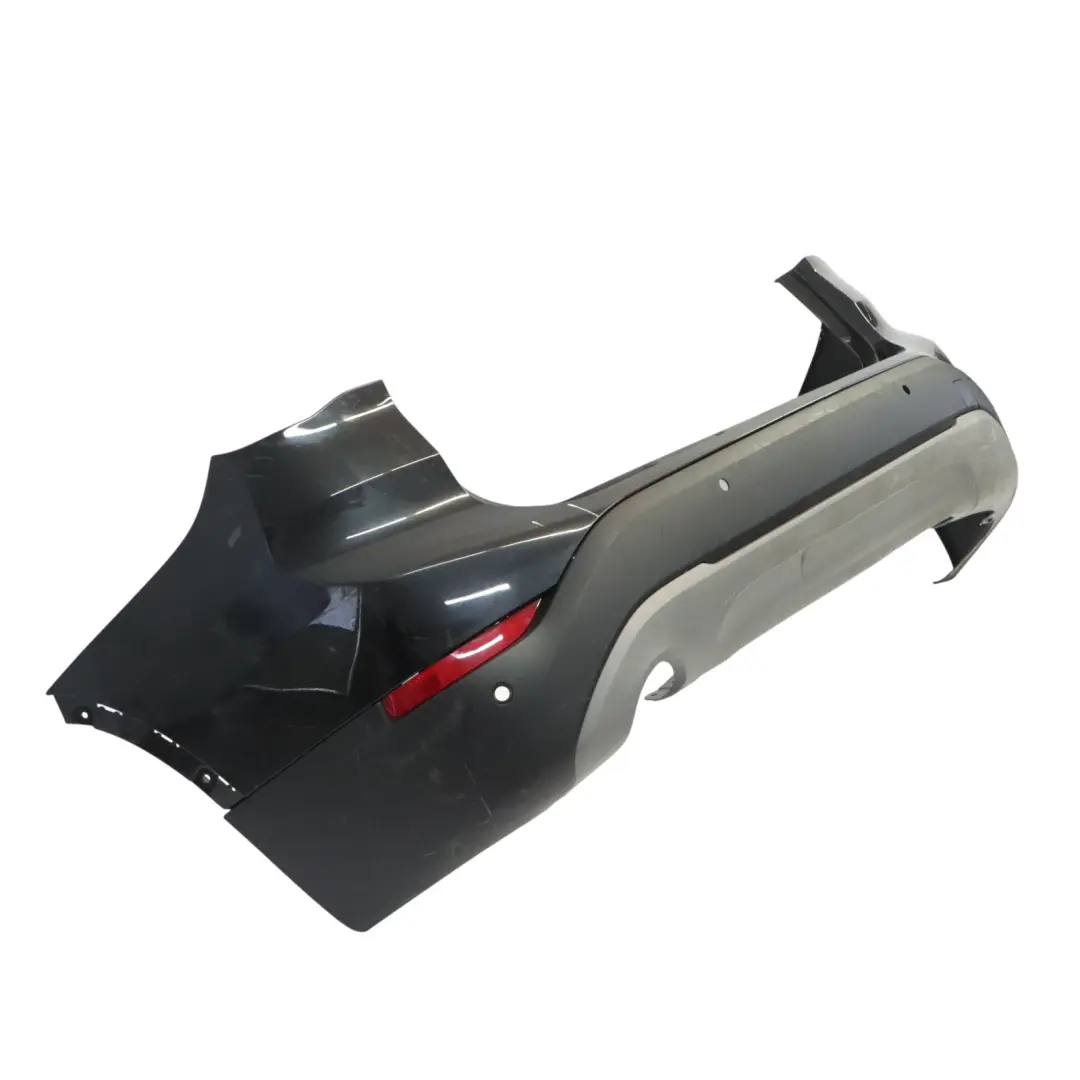 Tylny Zderzak PDC Black Sapphire Czarny Metalik - 475 do BMW X1 F48 o numerze 7403391 BMW X1 F48 Tylny Zderzak PDC Black Sapphire Czarny Metalik - 475 - SKU 7403391-BS - Numer Części 7403391