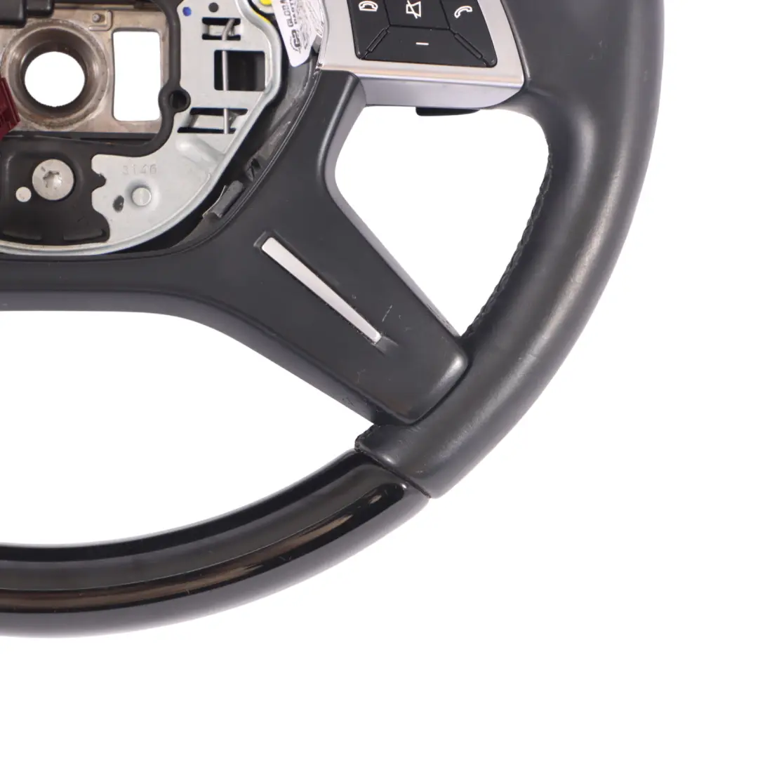 Cuero Piano Negro Designo Palanca de Cambio para Volante Mercedes W166 W463 con número de pieza A1664601918 Volante Mercedes W166 W463 Cuero Piano Negro Designo Palanca de Cambio - SKU A1664601918 - Número de pieza A1664601918