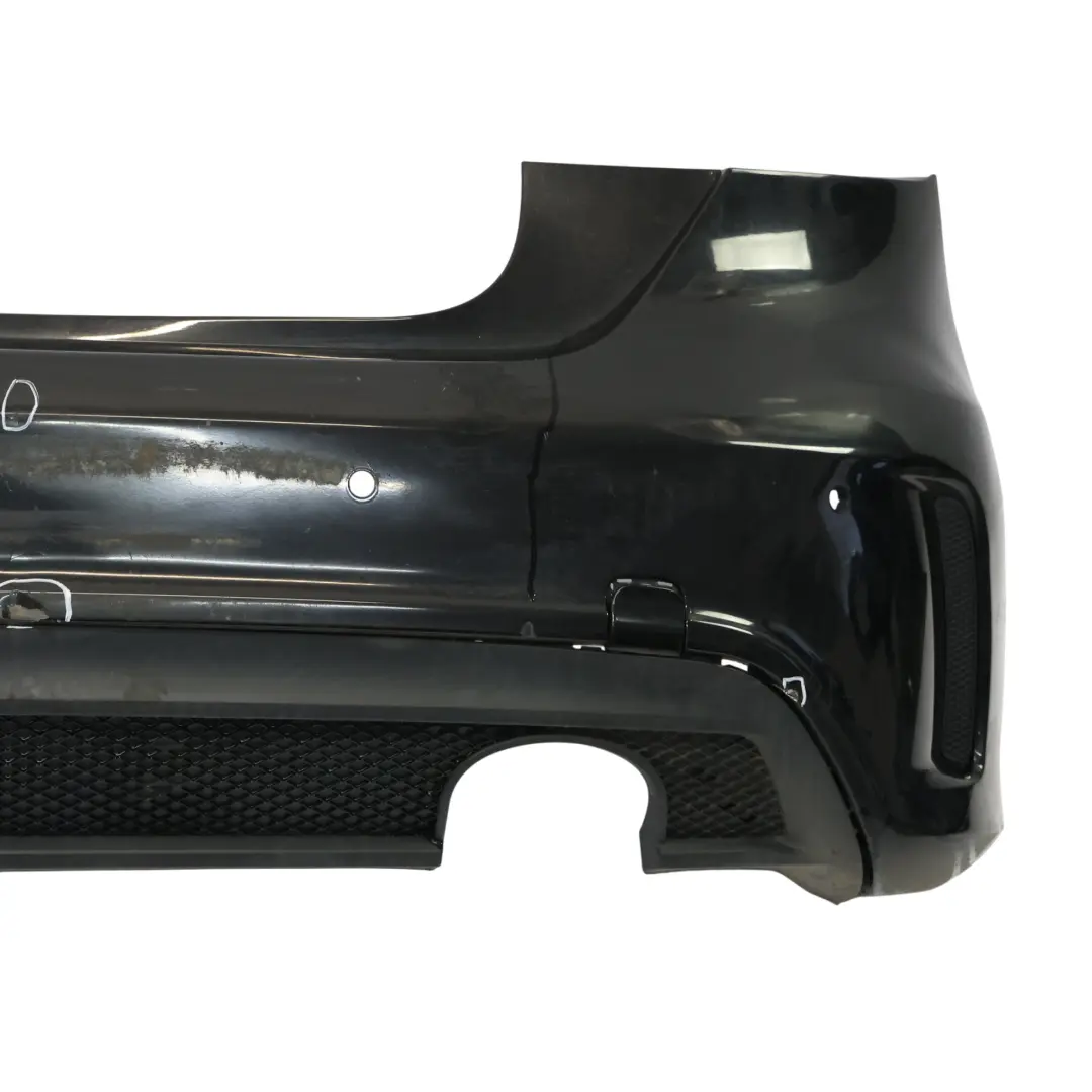 Bumper Rear Trim Panel AMG Kosmos Cosmic Black Metallic - 191 to Mercedes W176 with Part number A1768805840 Mercedes W176 Bumper Rear Trim Panel AMG Kosmos Cosmic Black Metallic - 191 - SKU A1768805840-KB - Part number A1768805840