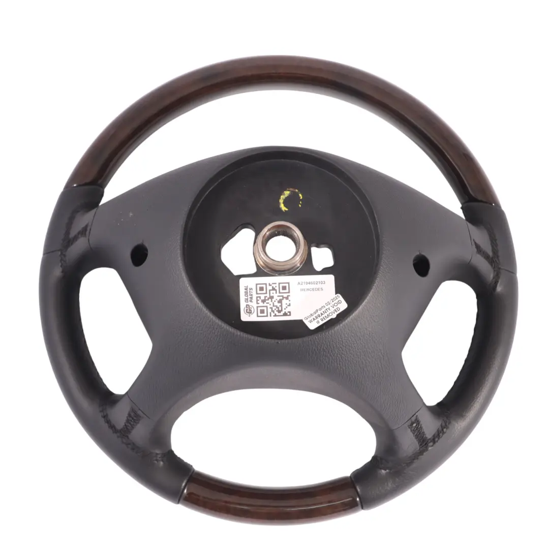 Steering Wheel Black Leather Wood to Mercedes CLS C219 with Part number A2194602103 Mercedes CLS C219 Steering Wheel Black Leather Wood - SKU A2194602103 - Part number A2194602103