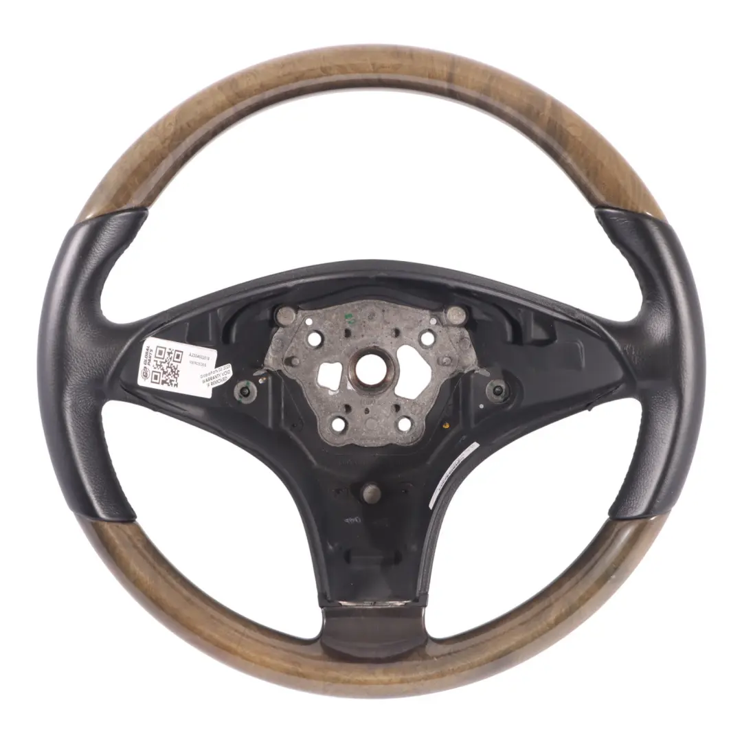 Cuero Negro Madera para Volante Mercedes SLK R171 SL R230 con número de pieza A2304602518 Volante Mercedes SLK R171 SL R230 Cuero Negro Madera - SKU A2304602518 - Número de pieza A2304602518