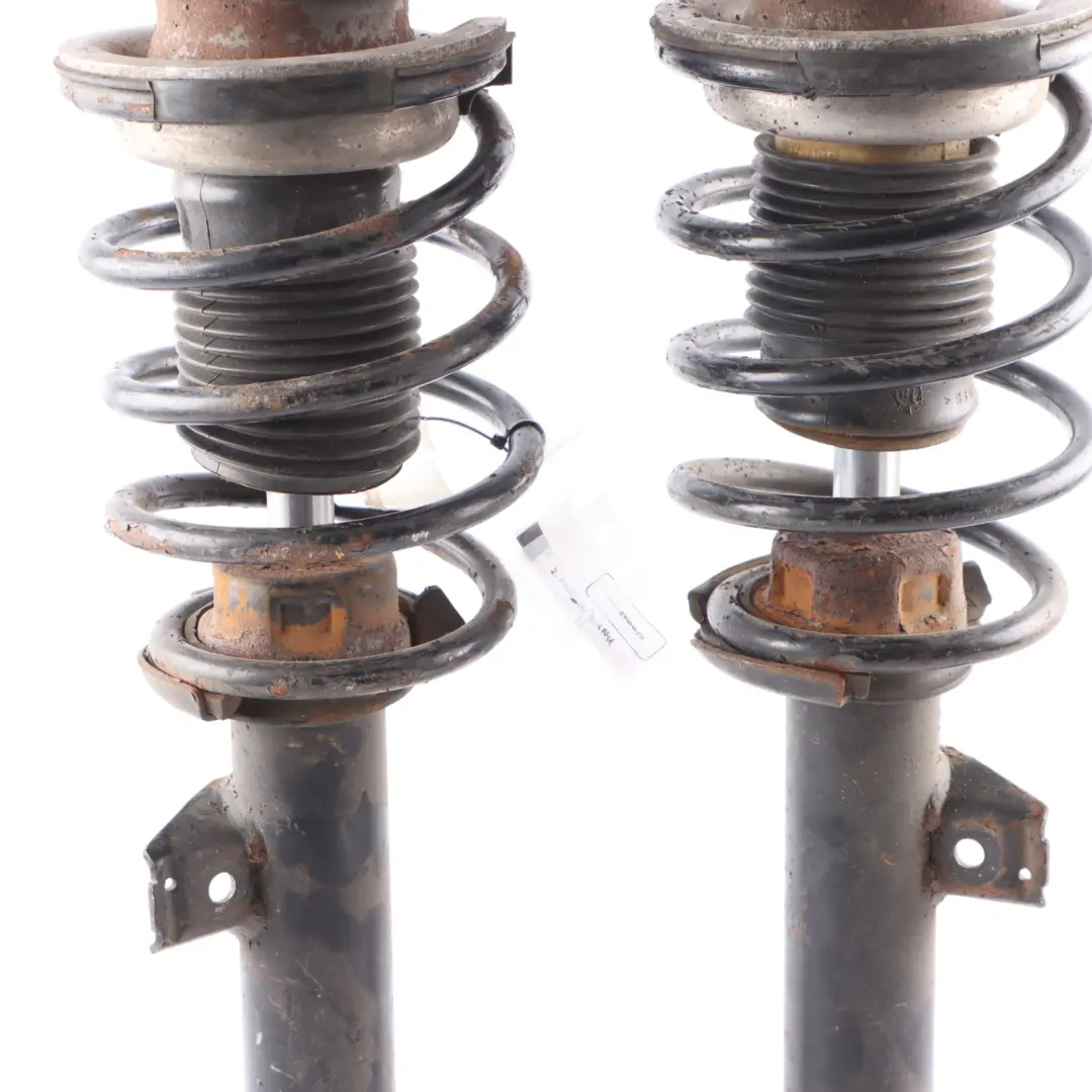 Strut BMW E90 E91 Front Left Right N/O/S Suspension Shock Absorber Set to Spring with Part number 757301-757302 Spring Strut BMW E90 E91 Front Left Right N/O/S Suspension Shock Absorber Set - SKU 757301-757302 - Part number 757301-757302