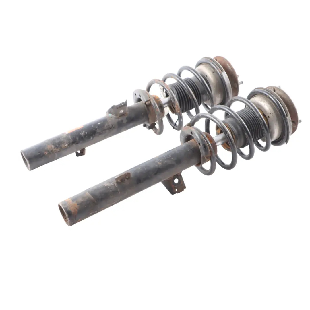 Strut BMW E90 E91 Front Left Right N/O/S Suspension Shock Absorber Set to Spring with Part number 757301-757302 Spring Strut BMW E90 E91 Front Left Right N/O/S Suspension Shock Absorber Set - SKU 757301-757302 - Part number 757301-757302