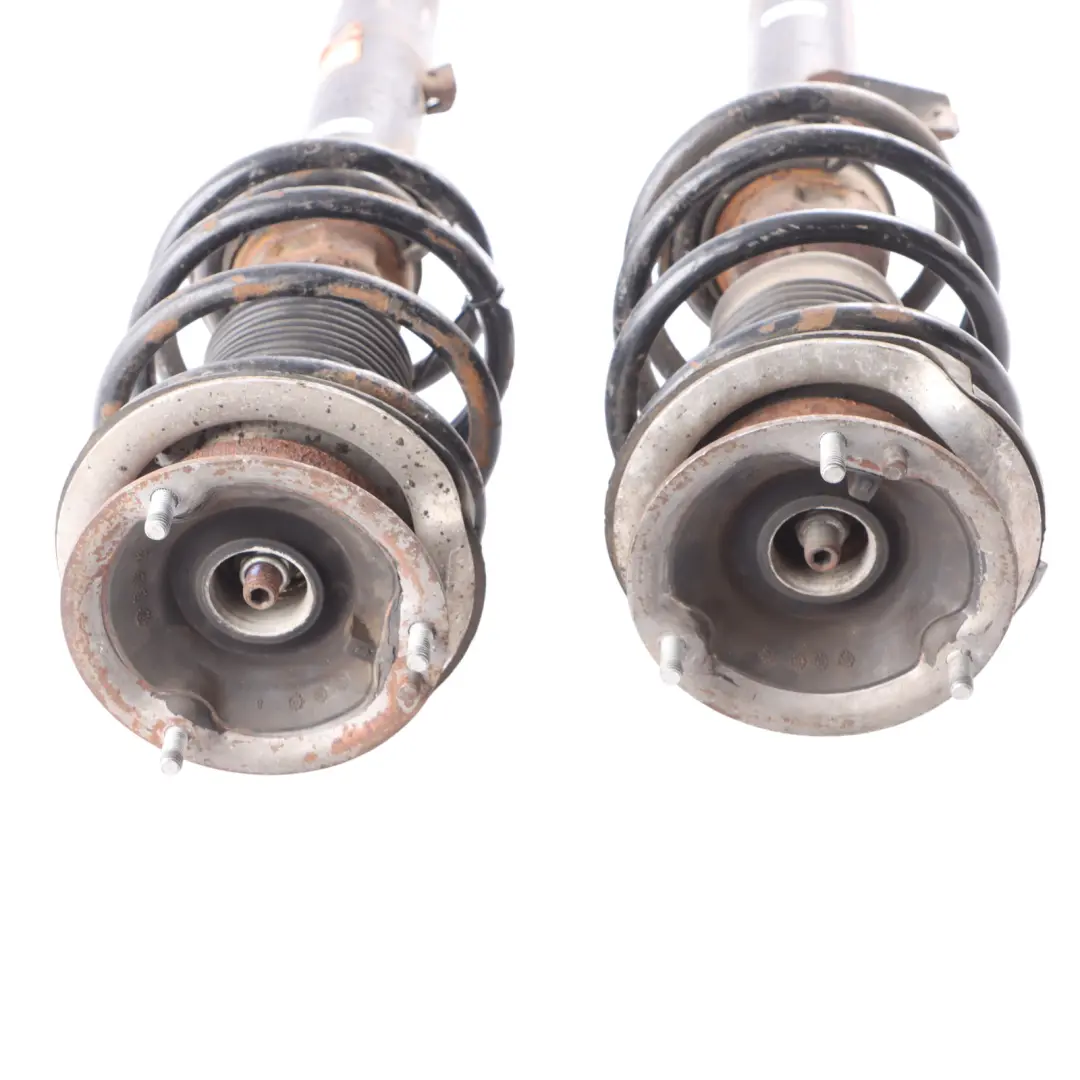 Strut BMW E90 E91 Front Left Right N/O/S Suspension Shock Absorber Set to Spring with Part number 757301-757302 Spring Strut BMW E90 E91 Front Left Right N/O/S Suspension Shock Absorber Set - SKU 757301-757302 - Part number 757301-757302