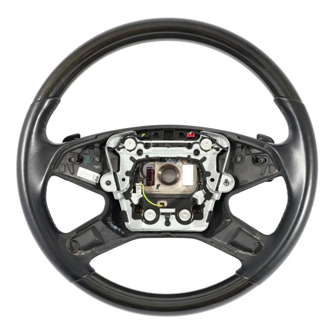Kierownica Czarna Skóra Drewno Łopatki do Mercedes W212 o numerze A2124601103 Mercedes W212 Kierownica Czarna Skóra Drewno Łopatki - SKU A2124601103 - Numer Części A2124601103