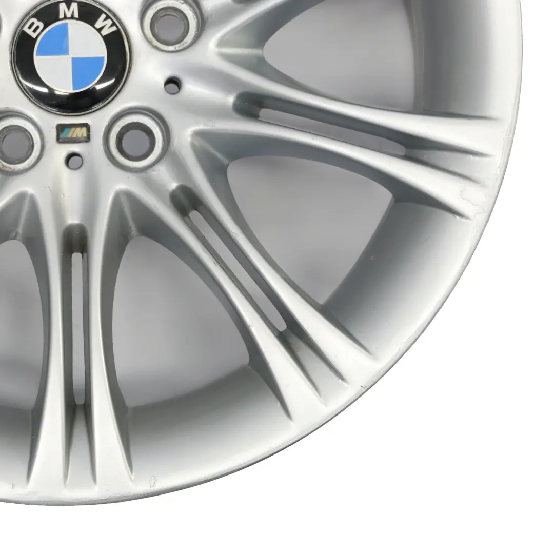 Silberne Leichtmetallfelge 18" ET:20 8J M Doppelspeiche 135 für BMW E60 E61 mit Teilenummer 8036947 BMW E60 E61 Silberne Leichtmetallfelge 18" ET:20 8J M Doppelspeiche 135 - SKU 8036947-10 - Teilenummer 8036947