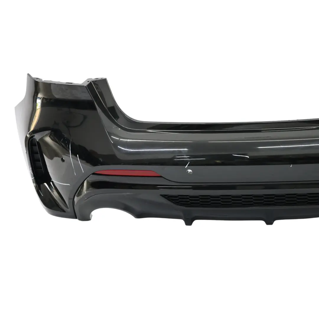 Tylny Zderzak M-Pakiet PDC Black Sapphire Czarny Metalik - 475 do BMW F40 o numerze 9881579 BMW F40 Tylny Zderzak M-Pakiet PDC Black Sapphire Czarny Metalik - 475 - SKU 9881579-BS1 - Numer Części 9881579