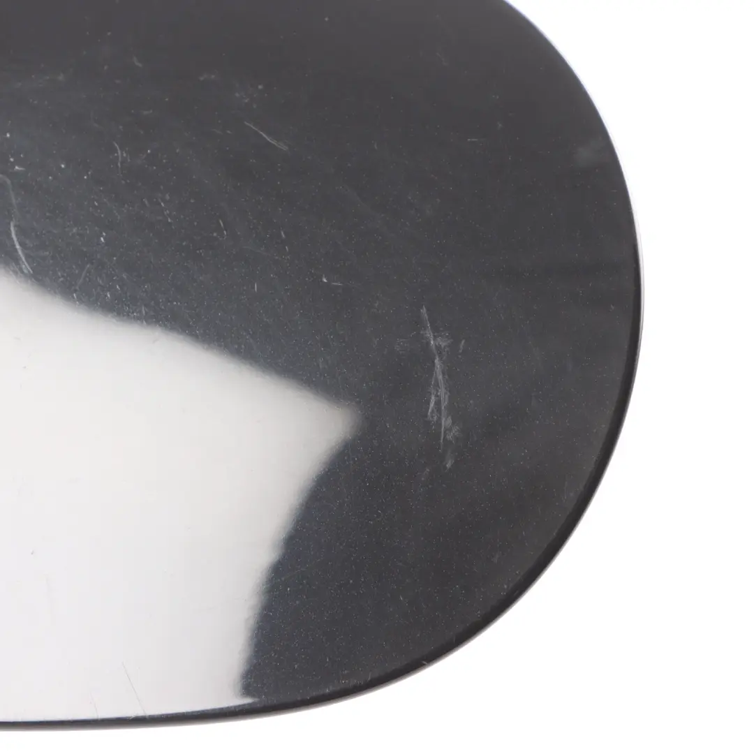 Flap Tank Cap Cover Kosmos Black Metallic - 191 to Mercedes W176 Fuel with Part number A1767570006 Mercedes W176 Fuel Flap Tank Cap Cover Kosmos Black Metallic - 191 - SKU A1767570006-KB - Part number A1767570006