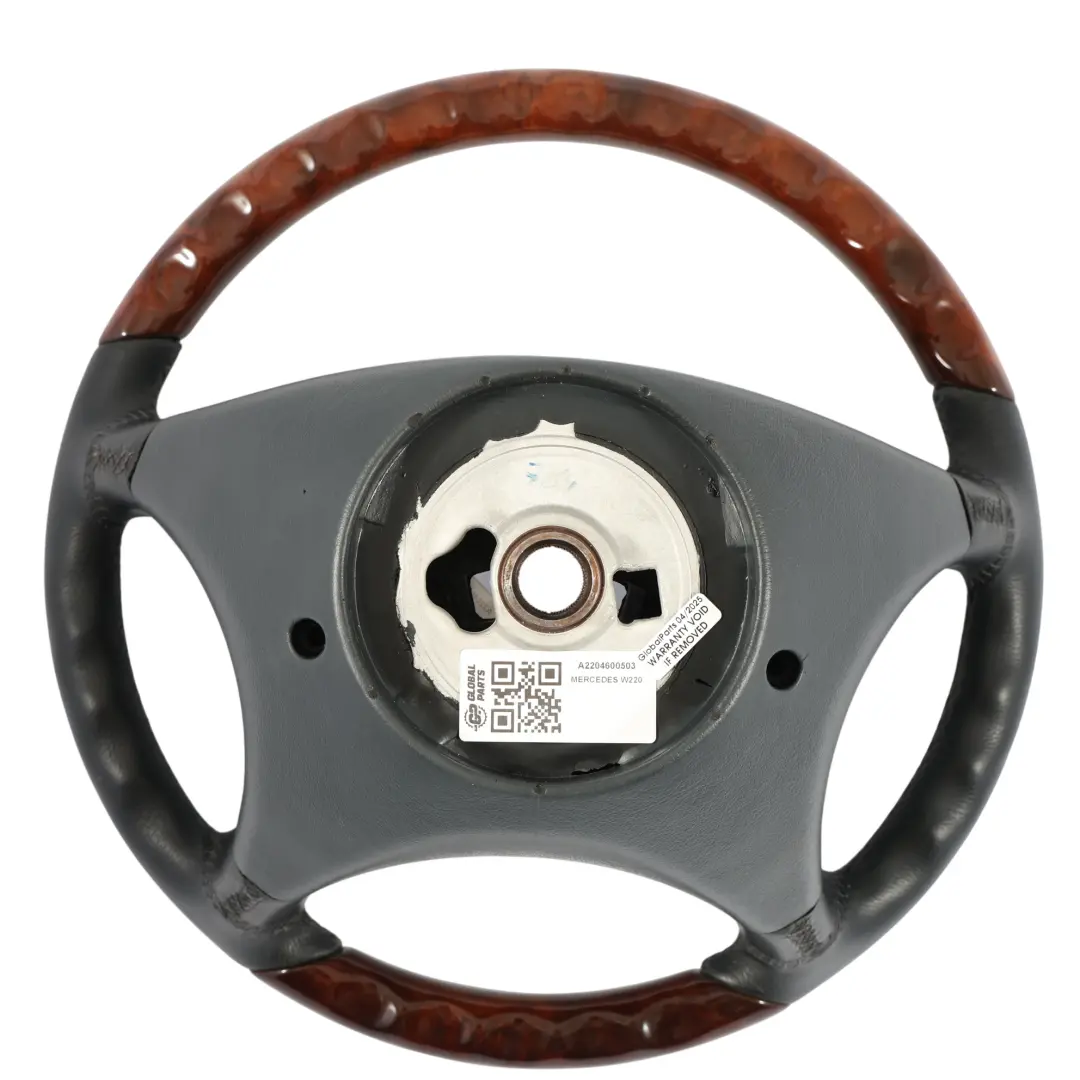 Kierownica Czarna Skóra Drewno do Mercedes C215 W220 o numerze A2204600503 Mercedes C215 W220 Kierownica Czarna Skóra Drewno - SKU A2204600503 - Numer Części A2204600503