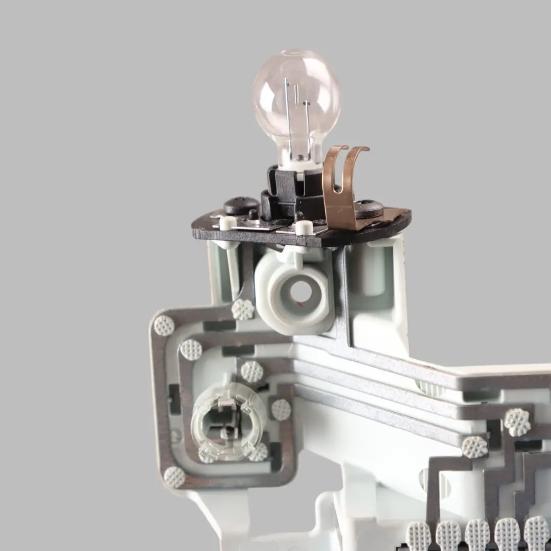 Light Bulb Socket Holder Left N/S to Mercedes W221 Rear Tailgate with Part number A2218200577 Mercedes W221 Rear Tailgate Light Bulb Socket Holder Left N/S - SKU A2218200577 - Part number A2218200577