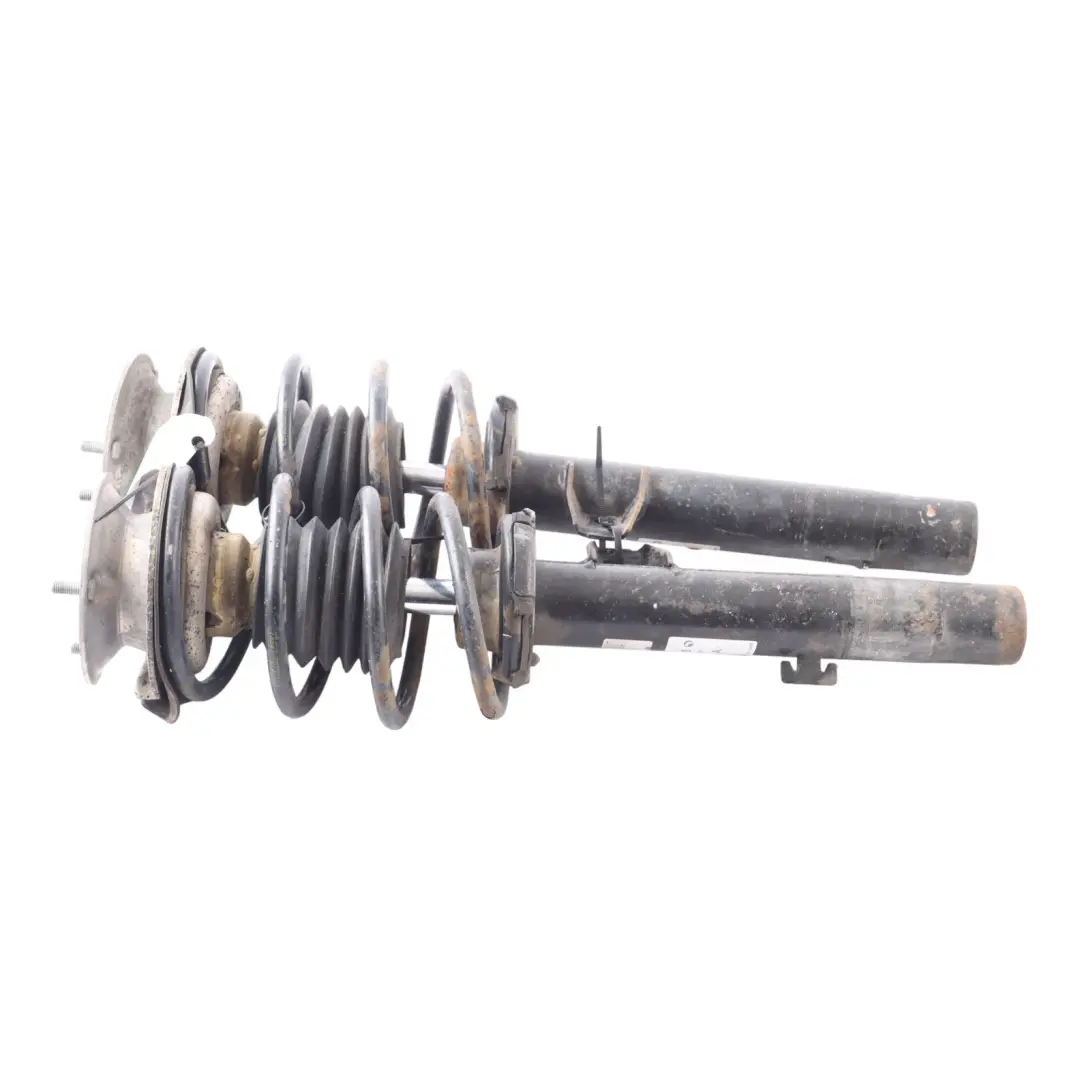 Front Axle Spring Shock Absorber Strut Left Right N/O/S Set to BMW E91 with Part number 6786016 BMW E91 Front Axle Spring Shock Absorber Strut Left Right N/O/S Set - SKU 6786016-6 - Part number 6786016