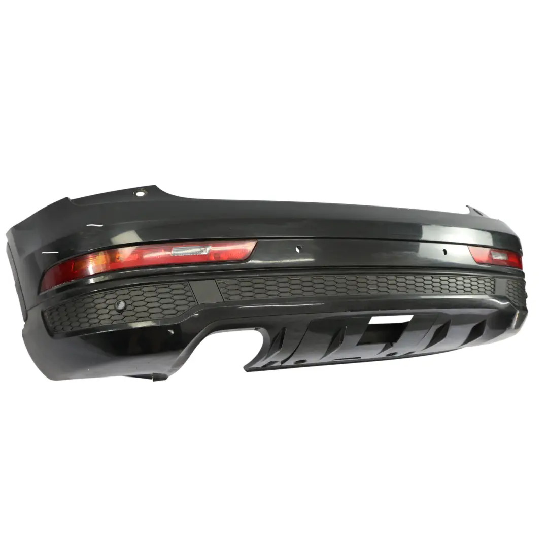 Bumper Trim Panel Covering Mythical Black Metallic - Y9T to Audi Q3 8U Rear with Part number 8U0807067F Audi Q3 8U Rear Bumper Trim Panel Covering Mythical Black Metallic - Y9T - SKU 8U0807067F-MYB - Part number 8U0807067F