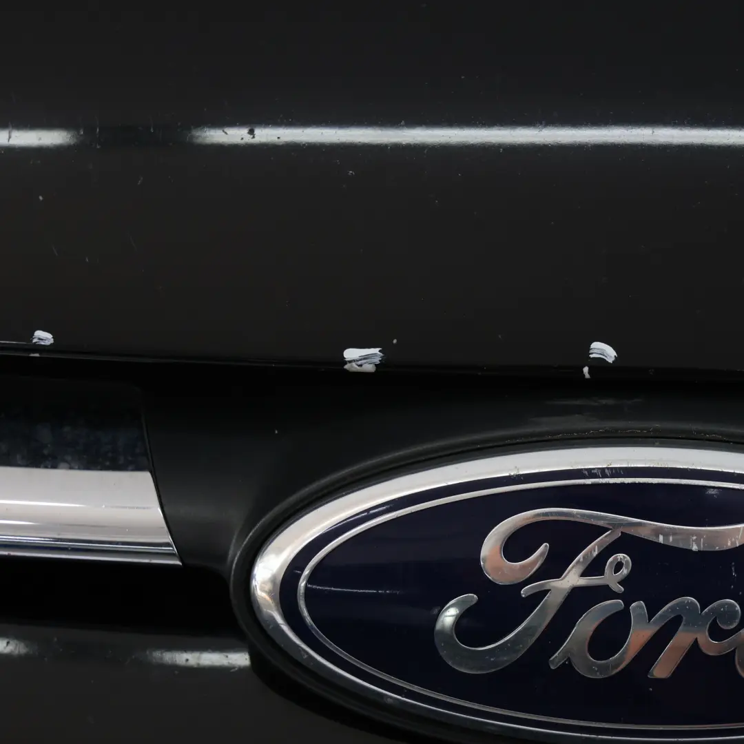 Zderzak Przedni Shadow Black Czarny - G1 do Ford Transit Connect o numerze 1898453 Ford Transit Connect Zderzak Przedni Shadow Black Czarny - G1 - SKU 1898453-SHA - Numer Części 1898453