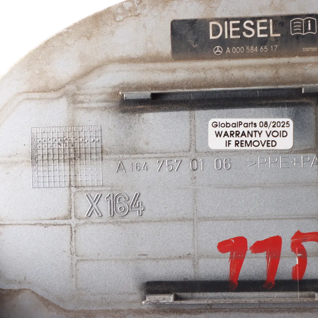 Filler Flap Cap Cover Trim Iridium Silver - 775 to Mercedes X164 Fuel with Part number A1647570106 Mercedes X164 Fuel Filler Flap Cap Cover Trim Iridium Silver - 775 - SKU A1647570106-IRS - Part number A1647570106