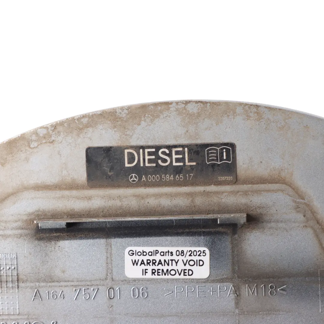Filler Flap Cap Cover Trim Iridium Silver - 775 to Mercedes X164 Fuel with Part number A1647570106 Mercedes X164 Fuel Filler Flap Cap Cover Trim Iridium Silver - 775 - SKU A1647570106-IRS - Part number A1647570106