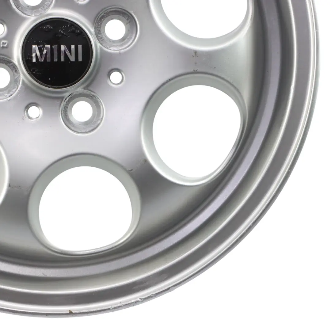Cerchio In Lega Argento 15" ET:45 5,5J 7 Fori 81 per Mini Cooper One R50 R56 con numero di parte 1512458 Mini Cooper One R50 R56 Cerchio In Lega Argento 15" ET:45 5,5J 7 Fori 81 - SKU 1512458-10 - Numero di parte 1512458