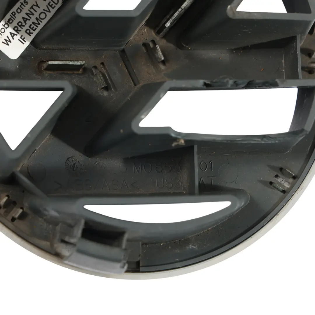 Volkswagen Touareg 7L Logo Emblemat Atrapy Grill Przedni Przód - SKU 5M0853601 - Numer Części 5M0853601