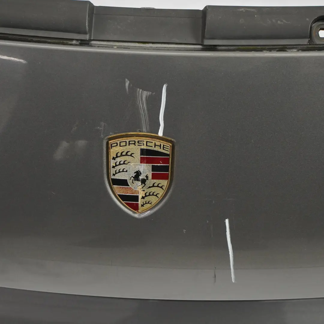 Front Bumper Trim Panel Covering Meteor Grey Metallic - M7W to Porsche Cayenne 9PA with Part number 95550531111 Porsche Cayenne 9PA Front Bumper Trim Panel Covering Meteor Grey Metallic - M7W - SKU 95550531111-MET - Part number 95550531111