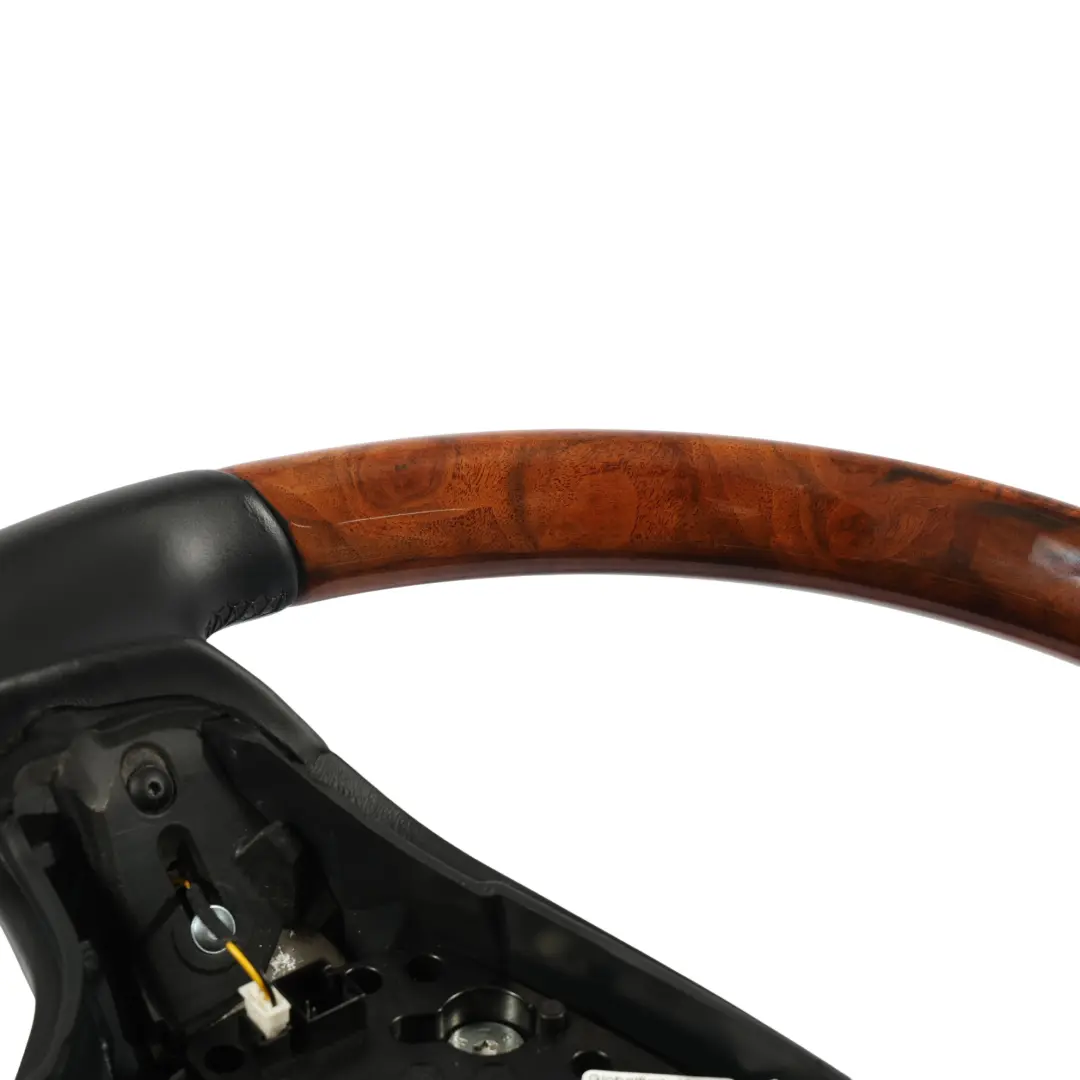 Kierownica Czarna Skóra Drewno do Mercedes C216 W221 o numerze A2214600303 Mercedes C216 W221 Kierownica Czarna Skóra Drewno - SKU A2214600303 - Numer Części A2214600303