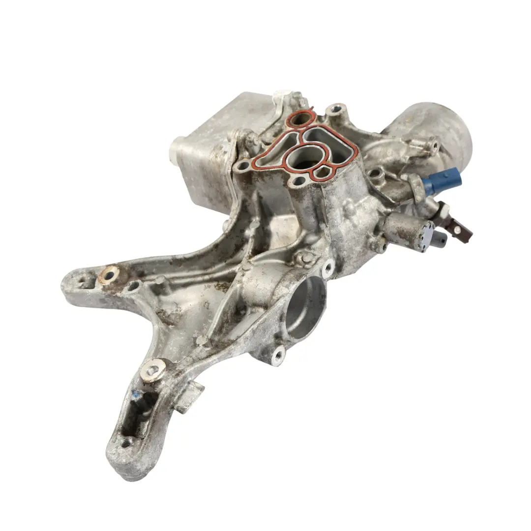 Wspornik Podstawa Filtra Oleju Chłodnica do Audi S3 8V 2.0 TFSI o numerze 06L903143D Audi S3 8V 2.0 TFSI Wspornik Podstawa Filtra Oleju Chłodnica - SKU 06L903143D-1 - Numer Części 06L903143D