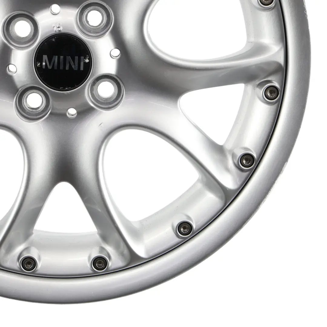 Cerchio Ruota Lega Argento 17" 7J ET:48 Web Cross Spoke 98 per Mini Cooper R50 R56 con numero di parte 6775686 Mini Cooper R50 R56 Cerchio Ruota Lega Argento 17" 7J ET:48 Web Cross Spoke 98 - SKU 6775686-4 - Numero di parte 6775686