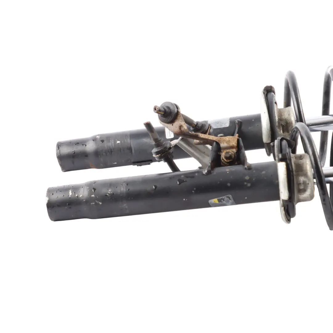Strut Set BMW E90 E91 E92 Shock Absorber Monroe Front Suspension to Spring with Part number G8293 Spring Strut Set BMW E90 E91 E92 Shock Absorber Monroe Front Suspension - SKU G8293 - Part number G8293