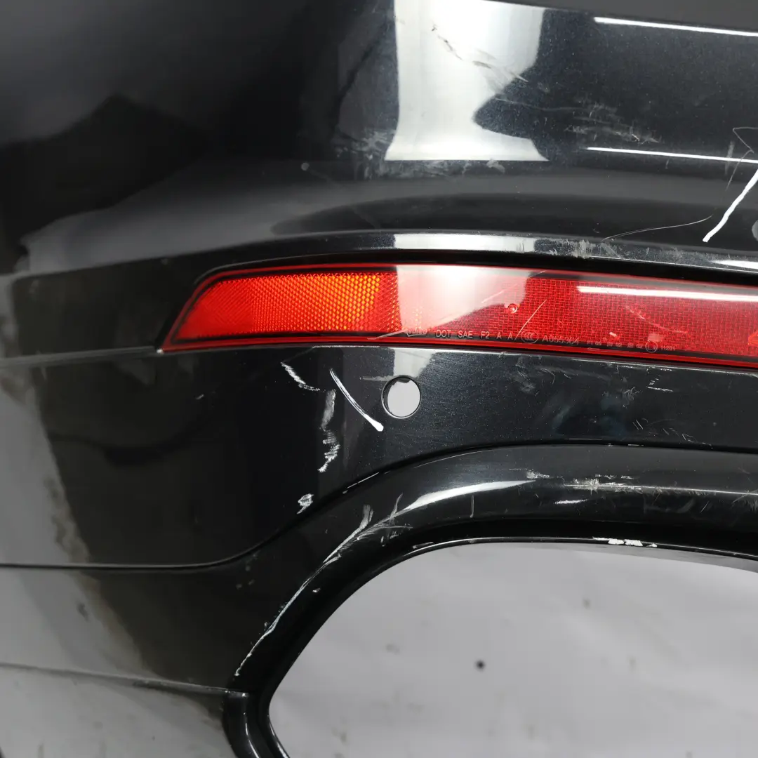 Bumper Trim Panel Covering Jet Black Metallic - C9X to Porsche Cayenne 92A Rear with Part number 95850541760 Porsche Cayenne 92A Rear Bumper Trim Panel Covering Jet Black Metallic - C9X - SKU 95850541760-JBL - Part number 95850541760