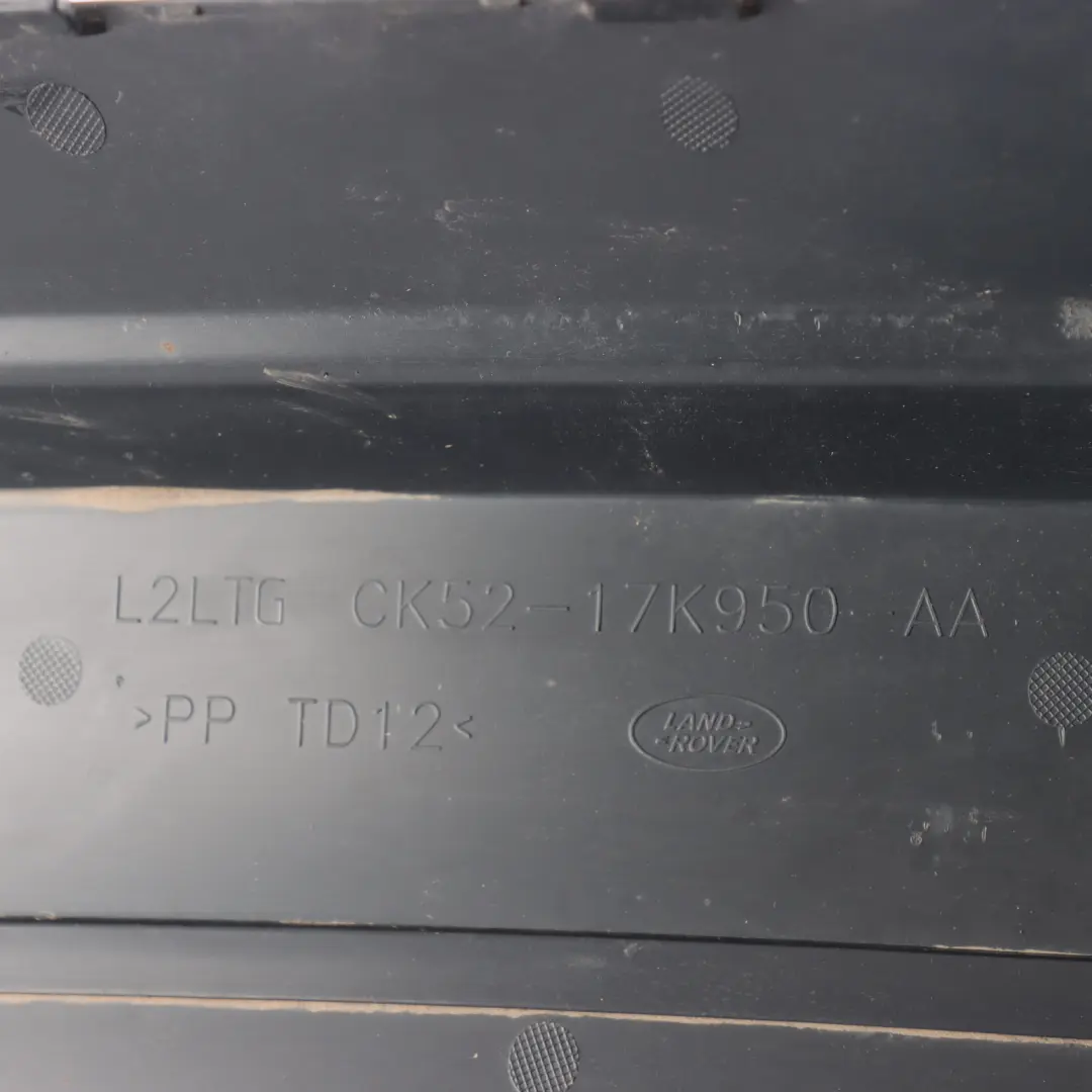 Towing Hook Opening Rear Bumper Lower Trim to Range Rover L405 with Part number CK52-17K950-AA Range Rover L405 Towing Hook Opening Rear Bumper Lower Trim - SKU CK52-17K950-AA - Part number CK52-17K950-AA