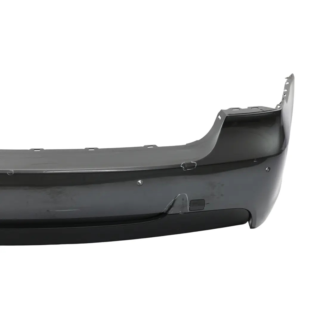 Zderzak Tył PDC M-Pakiet Sparkling Graphite Metalik - A22 do BMW E90 o numerze 0033541 BMW E90 Zderzak Tył PDC M-Pakiet Sparkling Graphite Metalik - A22 - SKU 0033541-SG - Numer Części 0033541