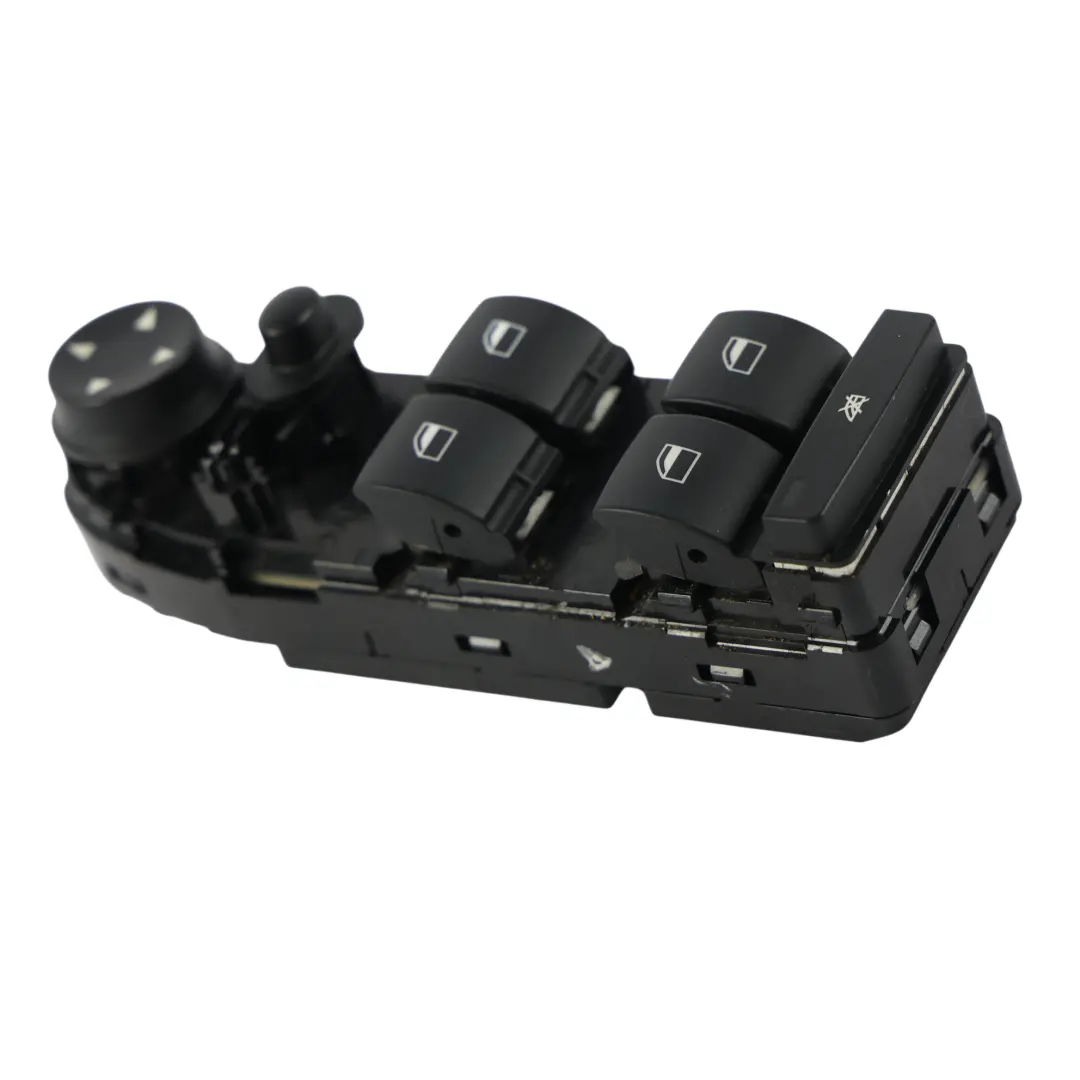 Interruttore Alzacristalli Lato Conducente SX per BMW E87 E87N con numero di parte 6952051 BMW E87 E87N Interruttore Alzacristalli Lato Conducente SX - SKU 6952051 - Numero di parte 6952051